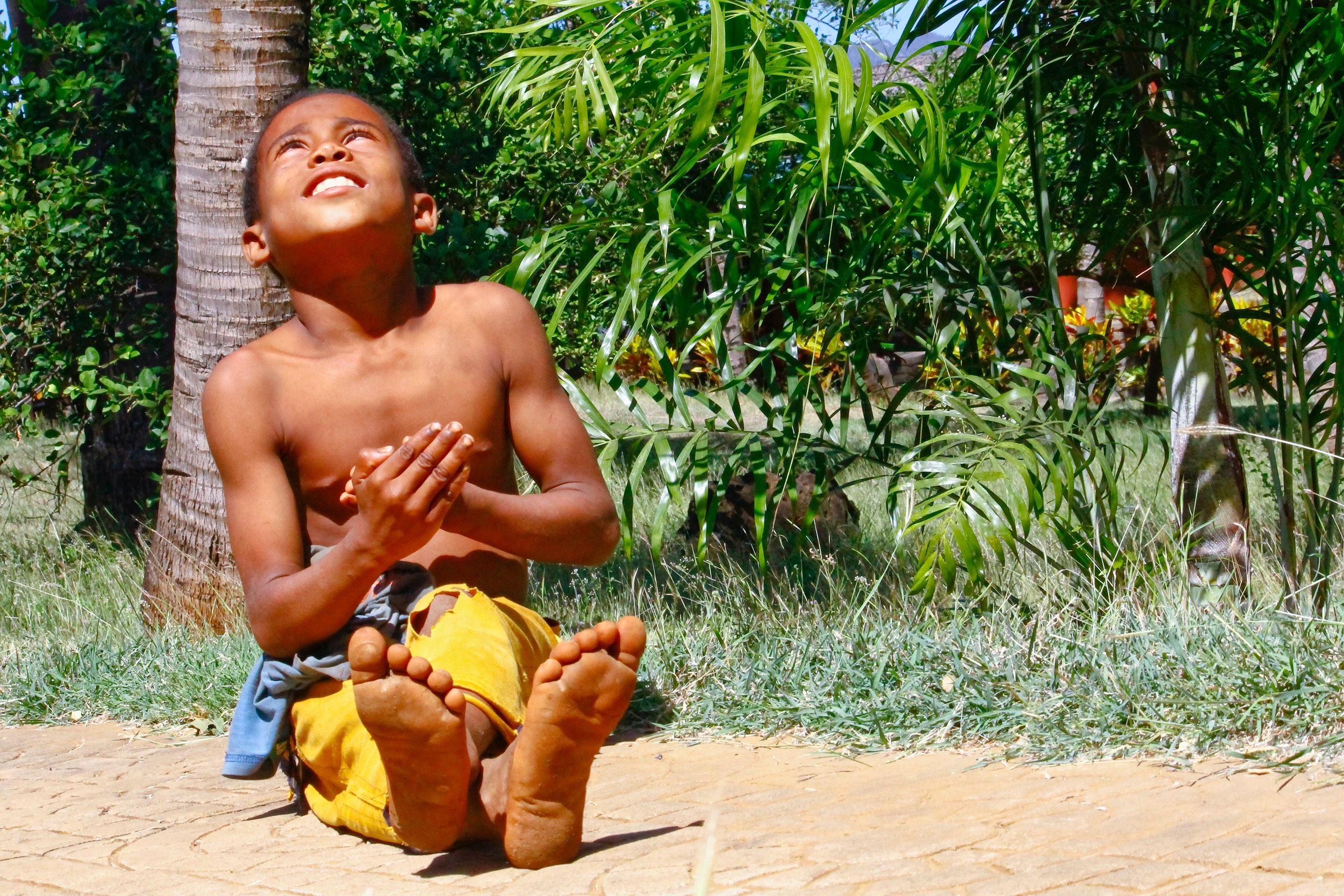 Happy,Malagasy,Boy,Playing,Outdoors